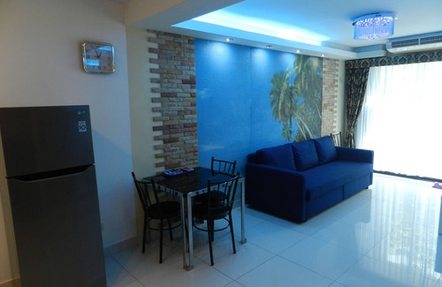 Jomtien Apartamento | Apartment bedroom + living room.