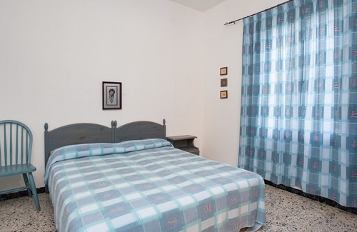 Cala Liberotto Apartamento | Apartamento Casa Azzurra con terraza y aire acondicionado