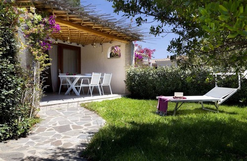 La Conia Apartamento | Apartamento "Casa Federica" cerca de la playa con aire acondicionado, Wi-Fi, terraza y jardín