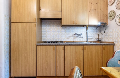 Sella Giudicarie Apartamento | Apartamento "Casa Nel Borgo Iris" con vistas a las montañas y jardín compartido