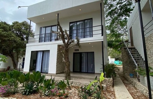 Tierra Bomba Island Apartamento | Apartamento 3 con balcón y vistas al jardín tropical