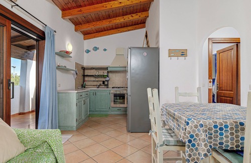 Monte Petrosu Apartamento | Apartamento 'Con Vista Porto Taverna' con vistas al mar, terraza privada y aire acondicionado.