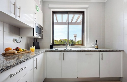 Alvor Apartamento | Apartamento 'Devvine Beach and Golf' con vistas al mar, Wi-Fi y aire acondicionado