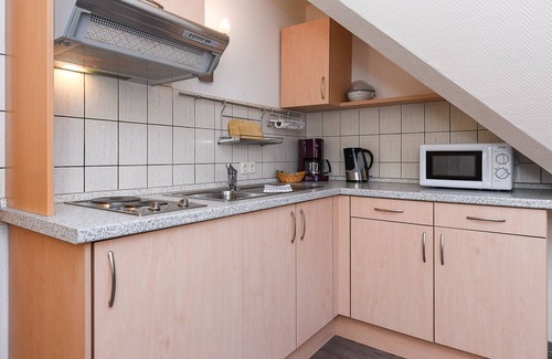 Esens Cabaña | Apartment Föhr - Pension Nordkap in Bensersiel