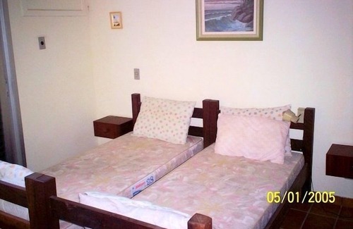 Caraguatatuba Apartamento | Apartamento frente al mar con hermosa vista