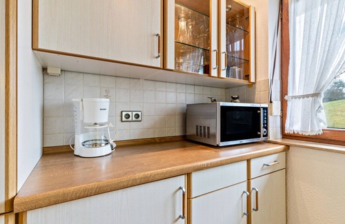 Baiersbronn Apartamento | Apartamento 'Ferienwohnung Panorama' con vistas a la montaña, terraza compartida y Wi-Fi