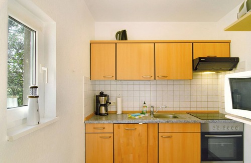 Wangerland Apartamento | Apartamento 'Ferienwohnung Strandkorb' con terraza privada y Wi-Fi
