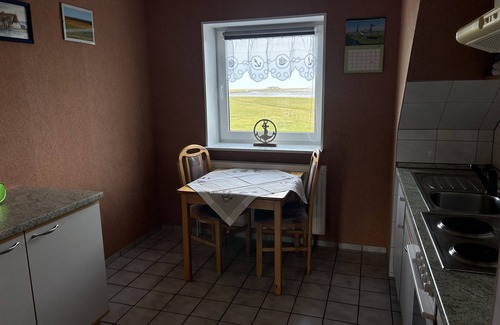 Hallig Langeneß Apartamento | Apartamento 'Ferienwohnung Godewind' con terraza compartida, jardín compartido y Wi-Fi