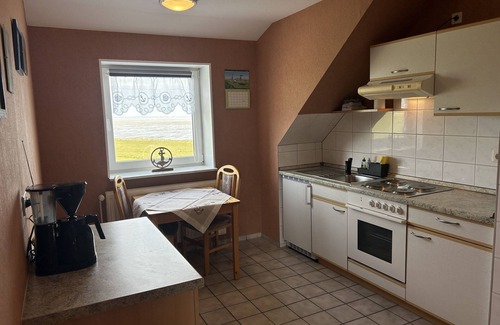 Hallig Langeneß Apartamento | Apartamento 'Ferienwohnung Godewind' con terraza compartida, jardín compartido y Wi-Fi