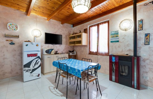 Bosa Apartamento | Apartamento 'Home Holidays Pintadera 1' con jardín y Wi-Fi