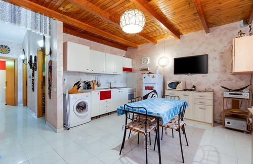 Bosa Apartamento | Apartamento 'Home Holidays Pintadera 1' con jardín y Wi-Fi
