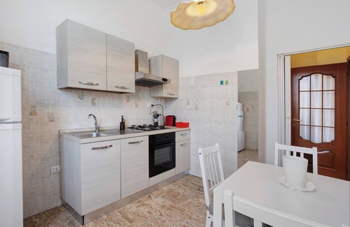 Central Station Apartamento | Apartamento 'Home Milano' con jardín compartido, Wi-Fi y aire acondicionado