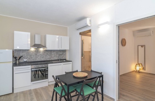Porto San Paolo Apartamento | Apartamento 'Il Piccolo Rifugio' con terraza privada, jardín privado y aire acondicionado