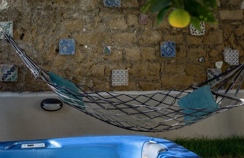 Rione Sanita Casa | Apartment immersed in a lemon grove oasis with an enveloping whirlpool