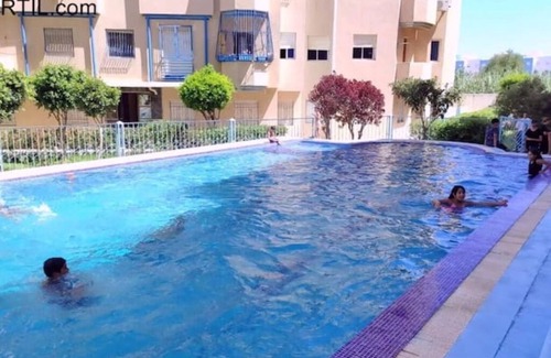 Miramar Apartamento | Apartment in Martil 3rd floor, swimming pool, Wi-Fi, fully equipped