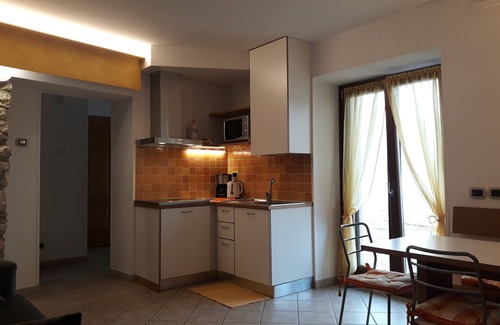 Cassone Apartamento | Apartamento en Rustico restaurado directamente en el lago, abierto todo el año.