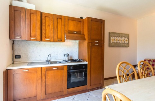 Cunettone Casa | Apartamento en Salò con piscina y olivos
