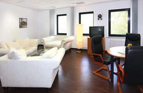 Raben Steinfeld Apartamento | Apartamento en Schwerin con tienda de bicicletas