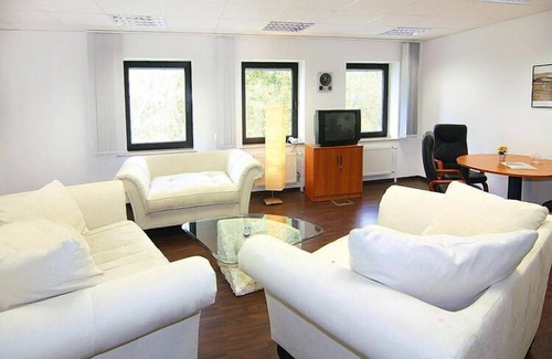 Raben Steinfeld Apartamento | Apartment in Schwerin with a bike store