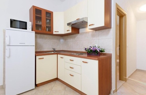 Seget Vranjica Apartamento | Apartamento en Seget Vranjica con Seaview, Balcón, Acondicionador, WIFI (5142-2)