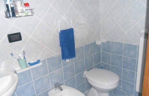 Cagnano Amiterno Cama Y Desayuno | Apartamento en una villa rodeada de un paisaje rural característico.