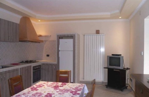 Cagnano Amiterno Cama Y Desayuno | Apartamento en una villa rodeada de un paisaje rural característico.