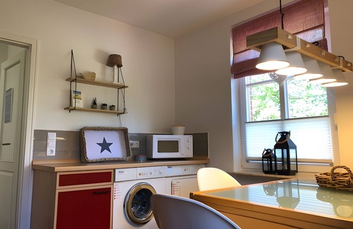 Baltrum Apartamento | Apartamento 'Inselhuuske I' con terraza privada, jardín privado y Wi-Fi