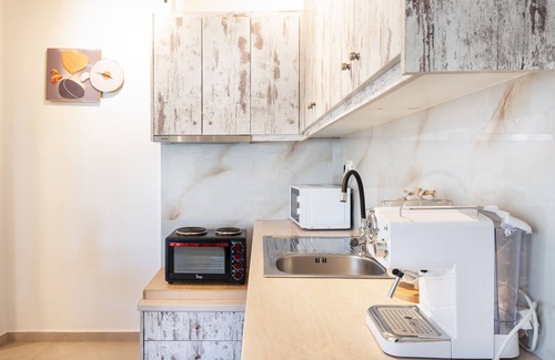 Tourlos Apartamento | Apartamento 'Irene's Studio' con piscina compartida, Wi-Fi y aire acondicionado