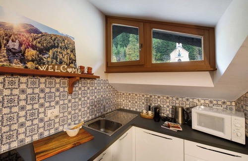 Gressoney-Saint-Jean Apartamento | Apartamento 'Finestra Sul Monte Rosa' con vistas a la montaña, jardín compartido y Wi-Fi