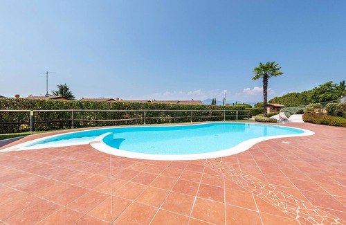 San Zeno di Montagna Apartamento | Apartamento 'Casa Bel Bosco' sobre el Lago de Garda con piscina climatizada, terraza y Wi-Fi