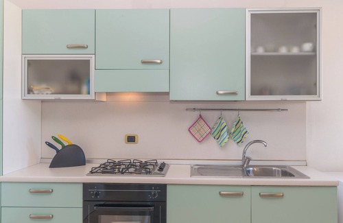 Porto Pozzo Apartamento | Apartamento "I Mirti di Porto Pozzo" cerca de la playa con vistas al mar, jardín y terraza