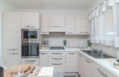 Santa Teresa di Gallura Apartamento | Apartamento 'Trilo Nina' con terraza privada, jardín privado y aire acondicionado
