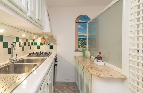 Santa Teresa di Gallura Apartamento | Apartamento 'Bilo Nina' con jardín privado y aire acondicionado