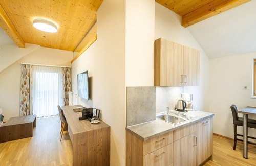 Uebelbach Apartamento | Apartment Käfer with breakfast in the Pension Herti - Haus Pastner am Teich