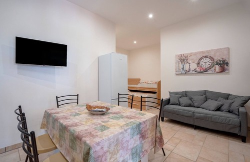 L'Assunta Apartamento | Apartamento 'L'Aia - 1' con piscina compartida, Wi-Fi y aire acondicionado