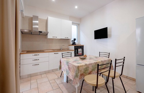 L'Assunta Apartamento | Apartamento 'L'Aia - 1' con piscina compartida, Wi-Fi y aire acondicionado