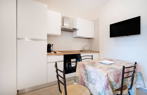 L'Assunta Apartamento | Apartamento 'L'Aia - 2' con piscina compartida, Wi-Fi y aire acondicionado