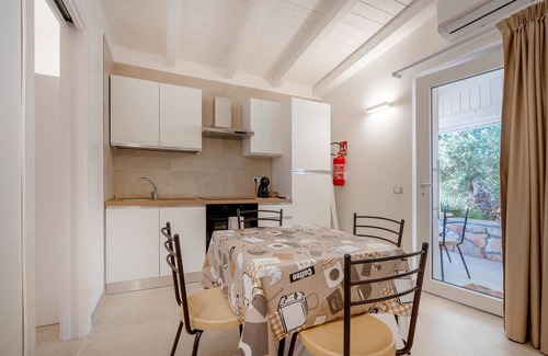 L'Assunta Apartamento | Apartamento 'L'Aia - 4' con piscina compartida, Wi-Fi y aire acondicionado