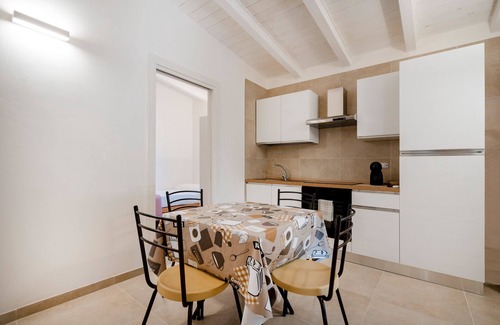 L'Assunta Apartamento | Apartamento 'L'Aia - 4' con piscina compartida, Wi-Fi y aire acondicionado
