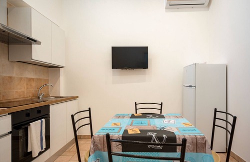L'Assunta Apartamento | Apartamento 'L'Aia - 5' con piscina compartida, Wi-Fi y aire acondicionado