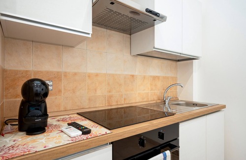 L'Assunta Apartamento | Apartamento 'L'Aia - 5' con piscina compartida, Wi-Fi y aire acondicionado