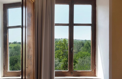 Costigliole d'Asti Apartamento | Apartamento 'La Rocca di Efisio - Grignolino' con balcón, Wi-Fi y aire acondicionado