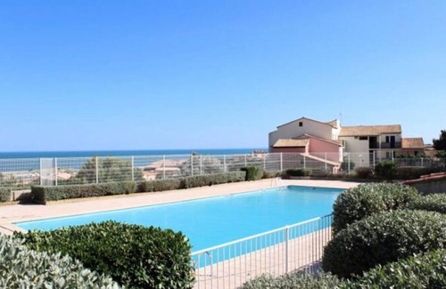 Saint-Pierre-la-Mer Apartamento | Apartamento 'La Perle Marine' con vistas al mar, piscina compartida y Wi-Fi