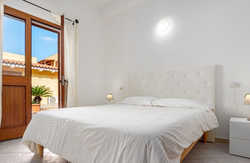 Le Vecchie Saline Apartamento | Apartamento "Le Saline" con jardín privado y aire acondicionado