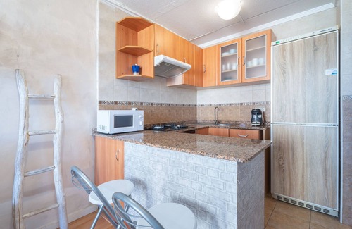 Playa Pobla de Farnals Apartamento | Apartamento 'Mabel' con piscina compartida, Wi-Fi y aire acondicionado