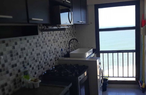 Ipiranga Casa | Apartment on Martim de Sá beach avenue, sea view, foot in the sand