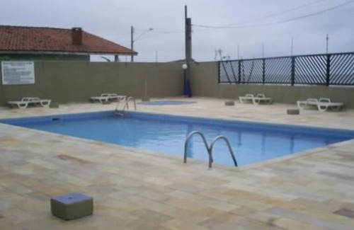 Centro Apartamento | Apartamento en la playa, caminar en la arena en Itanhaém, con piscina y vistas al mar