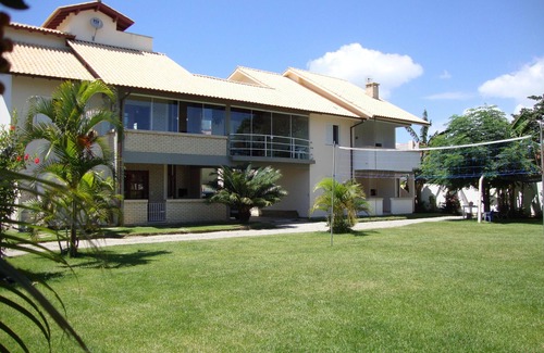 Cachoeira do Bom Jesus Apartamento | Apartamento en la playa de Cachoeira do Bom Jesus, 2 dormitorios, jardín. Cómodo!