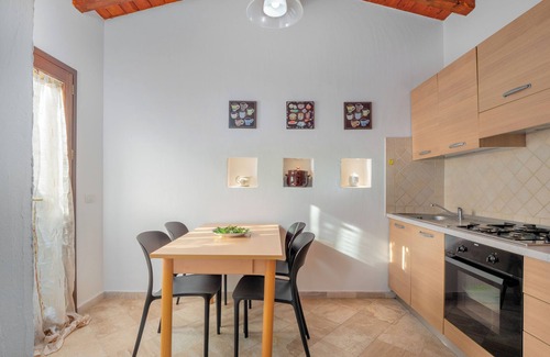 Baia Caddinas Apartamento | Apartamento 'Orizzonti 31' con vistas al mar, terraza privada y aire acondicionado