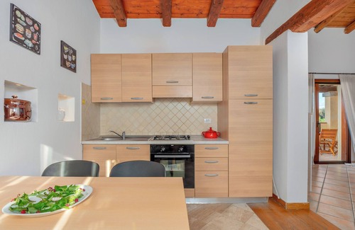 Baia Caddinas Apartamento | Apartamento 'Orizzonti 31' con vistas al mar, terraza privada y aire acondicionado